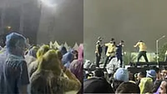 Fans Dance In Heavy Rain At Enrique's Mumbai Concert While Waiting For Singer, Water Accumulates On Stage - VIDEOS