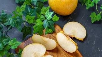 A Whole Pear Can Fit Diabetes Meal Planning with Portion Awareness
