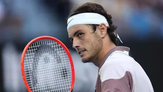 Australian Open: Taylor Fritz survives Royer scare, reaches second round