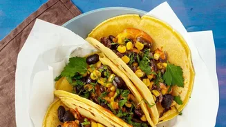 Black Bean And Tomato Breakfast Tacos: Breakfast Tacos Bring Beans into the First Meal