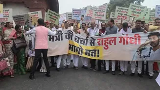 Chaos on Parliament premises as NDA, Congress MPs stage protest