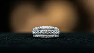 Jin Gifts RM an 18K White Gold Ring