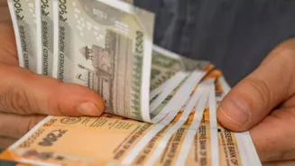 Some State Staff to Get Early Pay: Here's Why