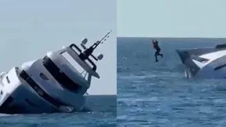 New Yacht Sinks; Owner Jumps Into Water