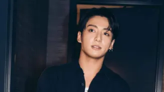 Jungkook's Bow Charms Fans at Fashion Week