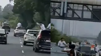 Luxury Car Convoy Halts Delhi Highway
