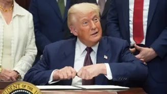 Trump Defends Tariffs, Hints at US Dividends