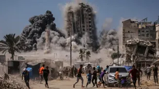 Israeli strike flattens more high-rises in Gaza