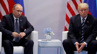 White House lowers hopes for Trump-Putin talks