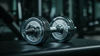 Build Bigger Shoulders With Dumbbell Presses