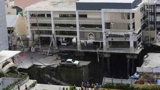 Bangkok Sinkhole Swallows Road, Damages Cars