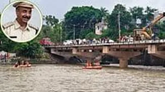 TI Dies As Car Plunges Into River; Search On