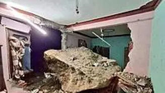 Boulder Kills Boy, Injures 4 in House Collapse
