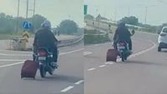 Man Drags Luggage From Bike In Viral Video