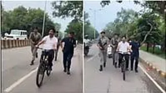 Minister's Cycling Video Sparks Fitness Debate